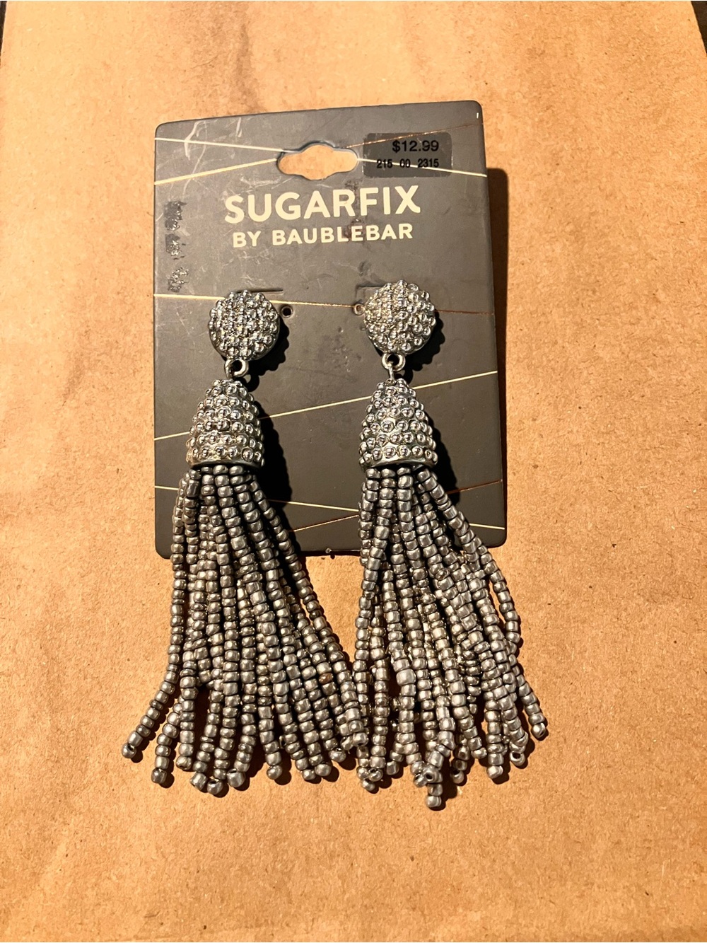 Shiney gray tassel earrings